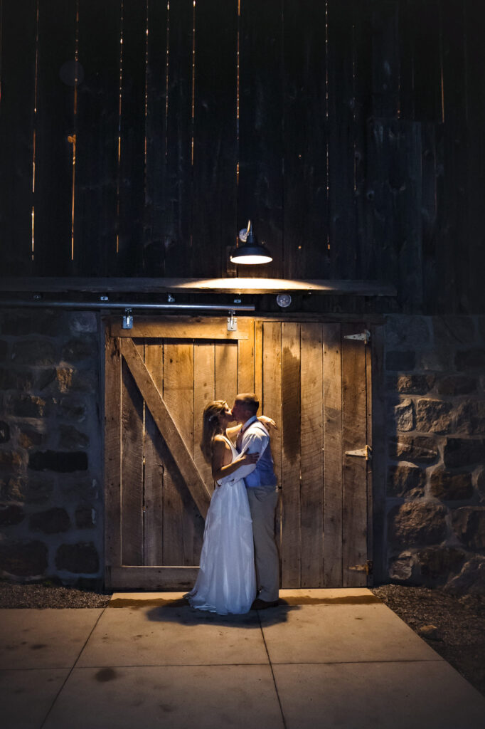 Starry Night Barn and Studios Wedding couple kissing
