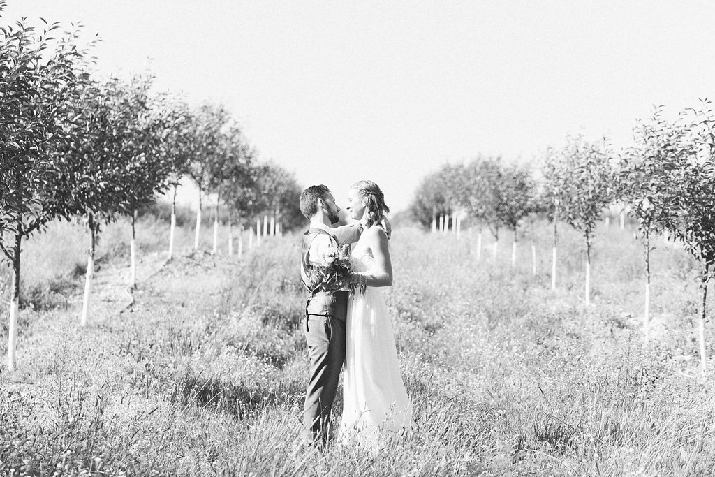 Married couple at Starry Night Barn orchard