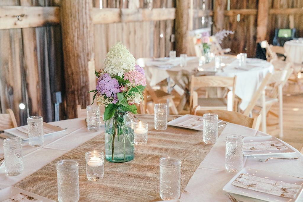 Reception table setup at Starry Night Barn and Studios Wedding